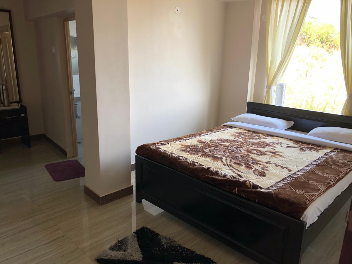 Отель Zion Elite Residency Кодайканал Экстерьер фото